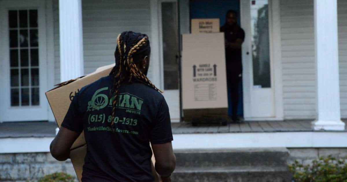 Two movers performing a move in a town in Nashville Tennessee metro area